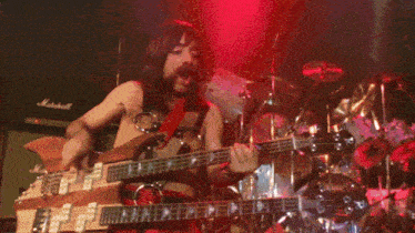 Derek Smalls from Spinal Tap playing a bass guitar